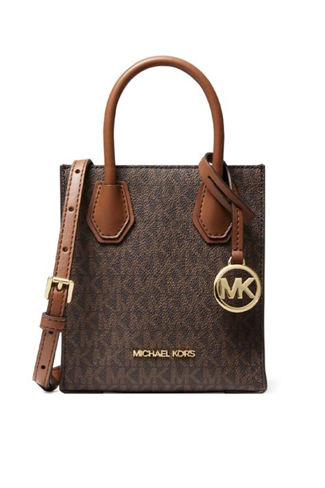 michael kors bag leather peeling|Michael Kors mercer small bag.